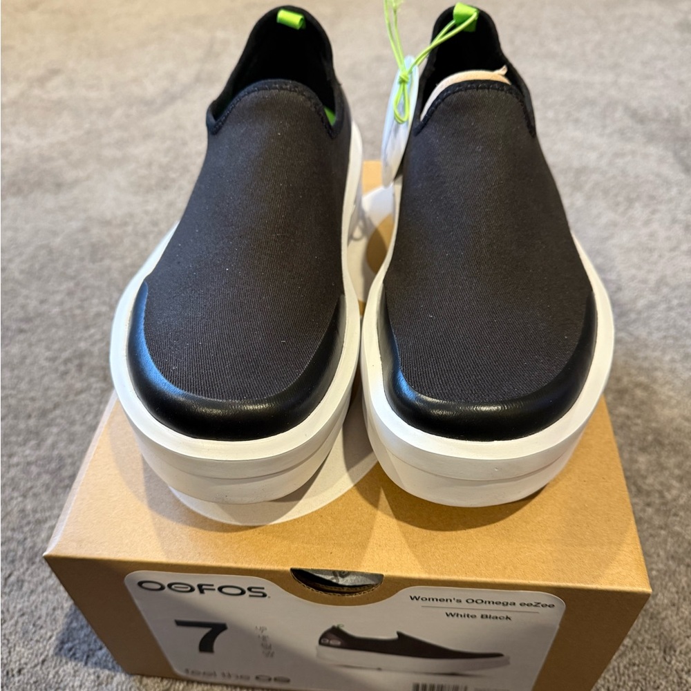 OOFOS Women's White and Black Slip-On Sneakers